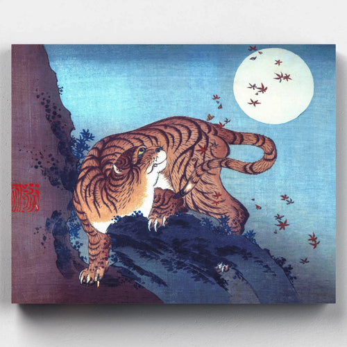 Tiger walking across dark rocks under a full moon with autumn leaves falling, in a Japanese woodblock-style composition with deep blues and rust tones.