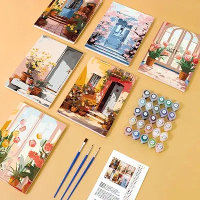Mini paint by numbers kit, including paintbrushes, acrylic paints, and canvases on a yellow background