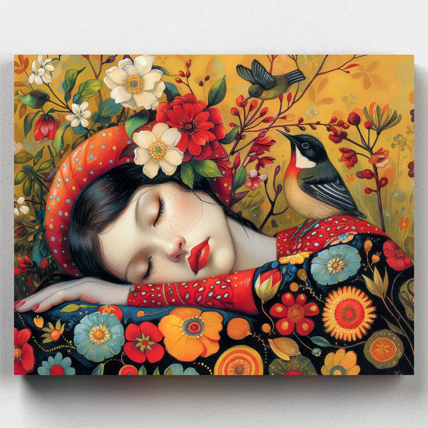 Colorful artwork of a woman with flowers and birds on a yellow background