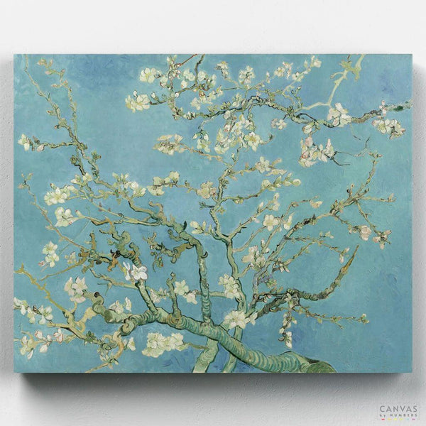 Almond Blossom - Paint by Numbers -  The almond blossom painting was created by Vincent Van Gogh in 1890 to celebrate the birth of his nephew, Vincent Willem. This painting features large branches of almond blossoms set against a bright blue sky, symbolizing new life and hope. The influence of Japanese printmaking is evident in the painting's bold outlines and unique composition, which add to its charm and elegance - Canvas by Numbers