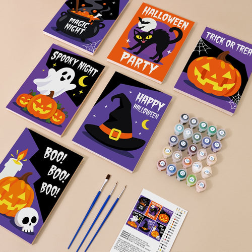 Cauldron & Candle Signs kit contents with six numbered canvases, paints, brushes and reference sheet
