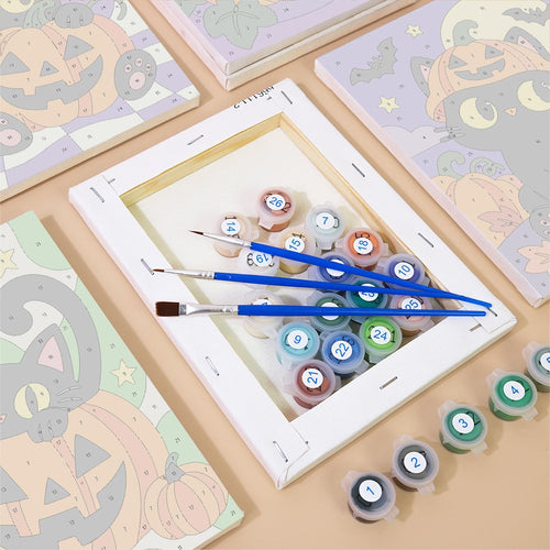 Numbered canvases, paint pots and brushes from the Checkerboard Kitty Lanterns set