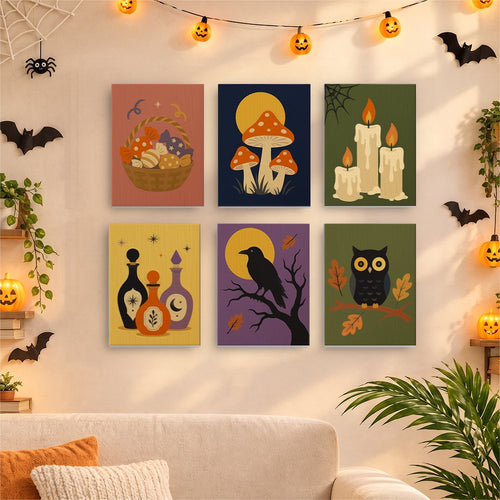 Crow & Candlelight mini canvases displayed together in a cozy Halloween living room