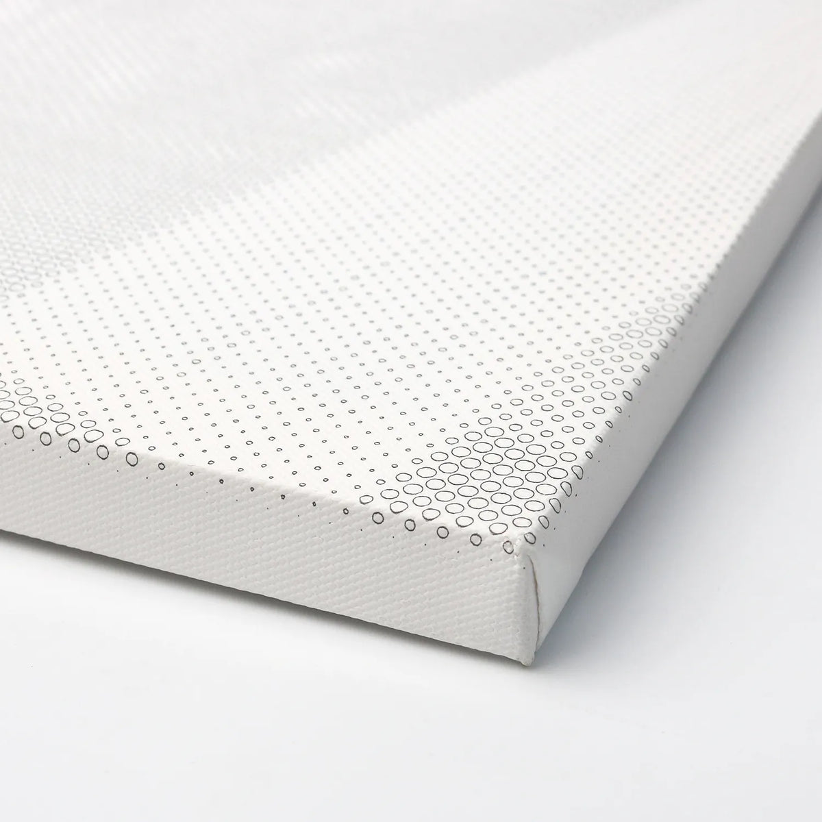 Close-up of canvas corner showing crisp dot pattern print quality