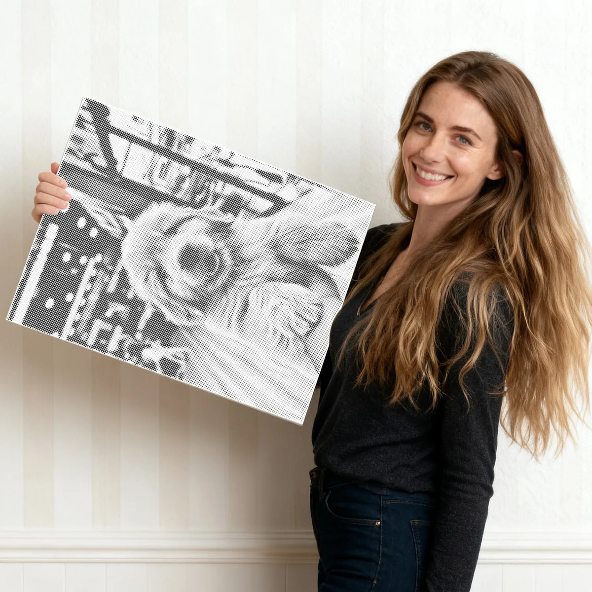 Woman holding a finished custom dot painting canvas