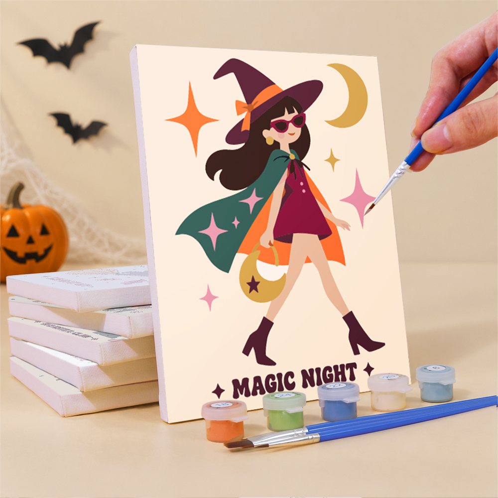 Painting one of the Far-Out Halloween mini canvases with a fine brush