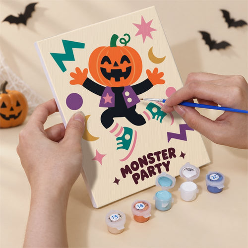 Hands painting a Far-Out Halloween design by numbers