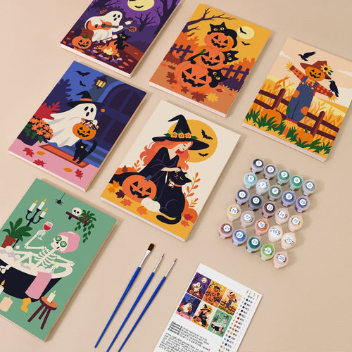 Fireside Fall Spooks kit contents with six numbered canvases, paints, brushes and reference sheet