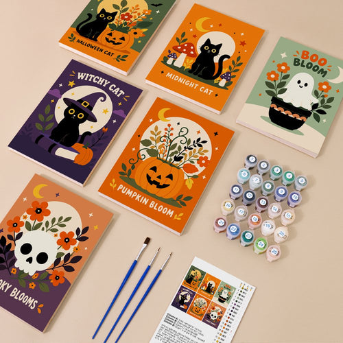 Floral Halloween Cats kit contents with six numbered canvases, paints, brushes and reference sheet