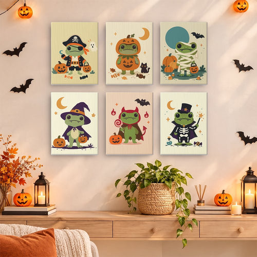 Frogs in Disguise mini paint by numbers set hung as a small Halloween gallery wall