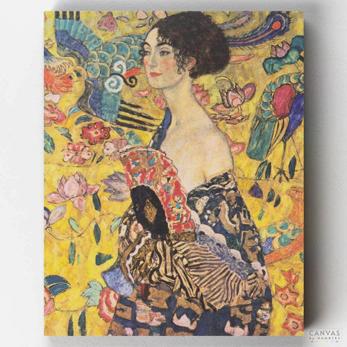 Lady with Fan. Lady with fan by Gustav Klimt is an homage to the female figure with Japanese influence. Colorful, intricate & fun. Get yours at CBN.