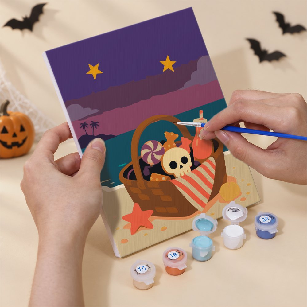 Hands painting a Monsters on Vacation design by numbers