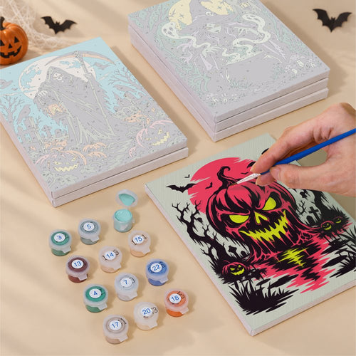 Blank numbered Nightmare Cathedral canvases next to acrylic paint pots