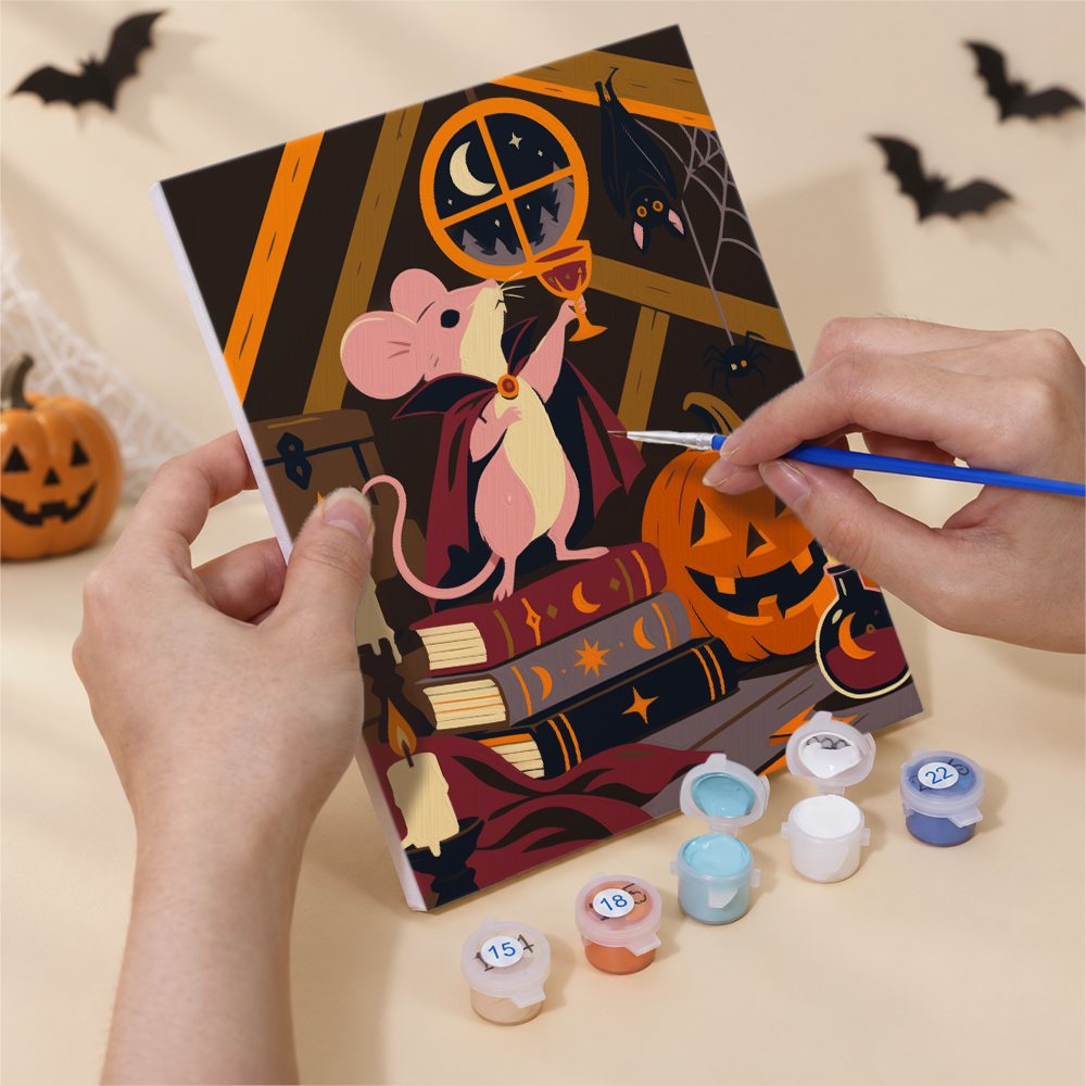 Hands painting an Old Legends by Moonlight design by numbers