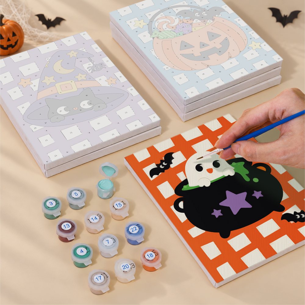 Blank numbered Plaid Pumpkin Party canvases next to acrylic paint pots