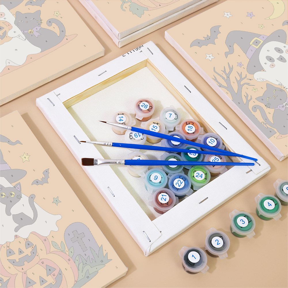 Numbered canvases, paint pots and brushes from the Pointy Hat Spooks set