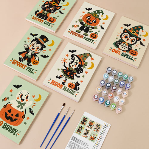 Retro Halloween Mascots kit contents with six numbered canvases, paints, brushes and reference sheet