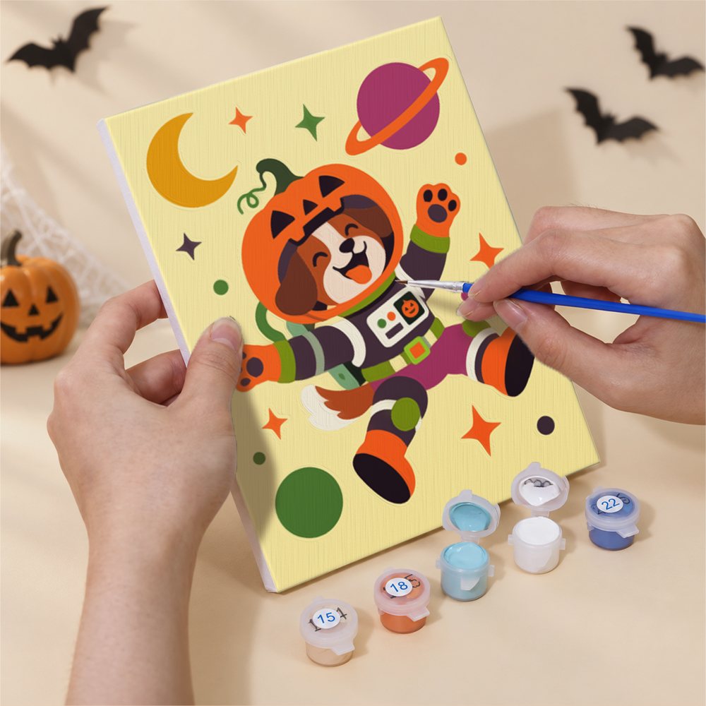 Hands painting a Roller Skate Ghost & Pals design by numbers