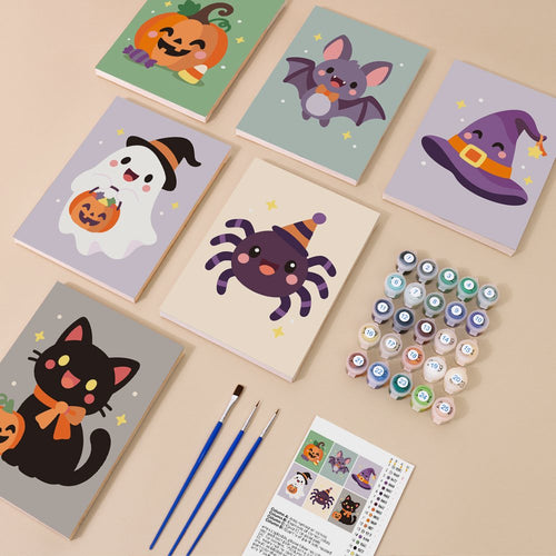 Soft Kawaii Halloween kit contents with six numbered canvases, paints, brushes and reference sheet