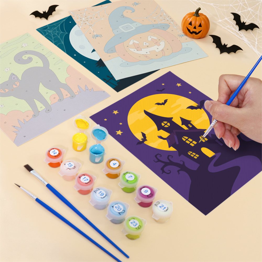 Close-up of a Teal & Tangerine Halloween mini canvas halfway painted