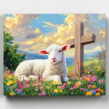 Painting of a lamb lying in a field with flowers and a wooden cross in the background.