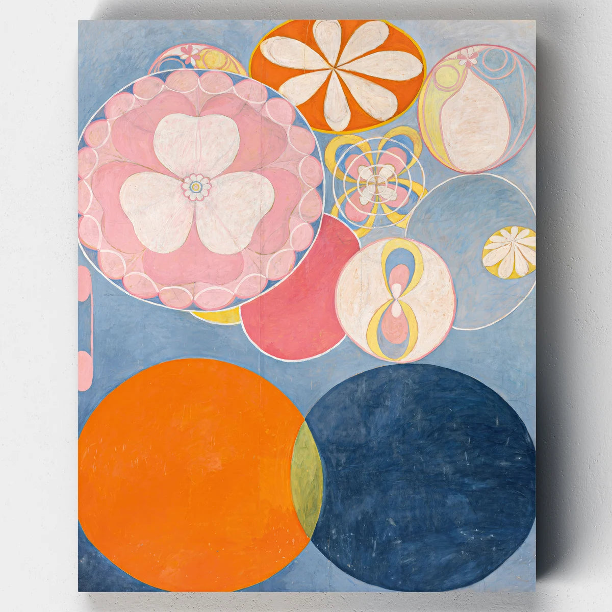 Abstract art piece with colorful circles and floral patterns on a blue background