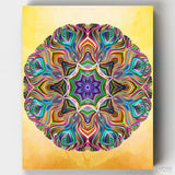 Trust - A Kaleidoscope Mandala Paint by Numbers Kit from Canvas by Numbers. A vibrant colorful painting kit on a yellow background. 