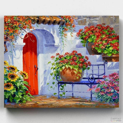 Warm Breath of Summer. A small white house covered by flowers. Enjoy the Mediterranean beauty with our exclusive painting kits! Licensed artwork made with the best materials.