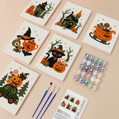 Witchy Holiday Mashup kit contents with six numbered canvases, paints, brushes and reference sheet