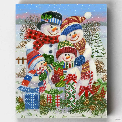 With Presents for All. Start planning your Christmas decor with this fun paint by numbers kit. A snowman family, with colorful ornaments to get in the holiday spirit.