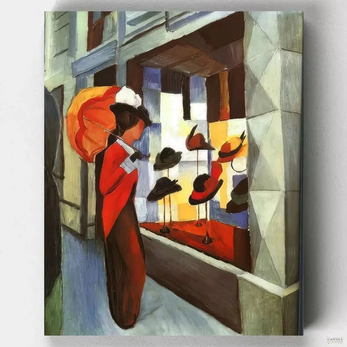 Woman with Umbrella in Front of a Hat Shop (1914). A woman standing on a busy street corner in front of a hat shop, holding an umbrella, gives life to this paint by numbers by master August Macke.