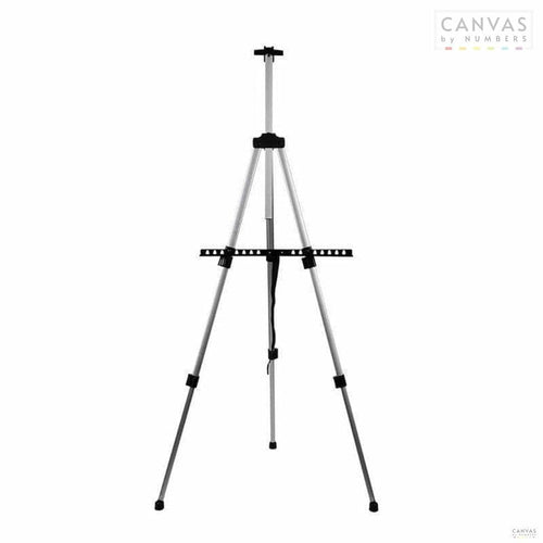 Aluminum Folding Easel. This folding easel is the perfect companion for a framed paint by numbers. Lightweight and foldable for easy storage! Get yours today at CBN.